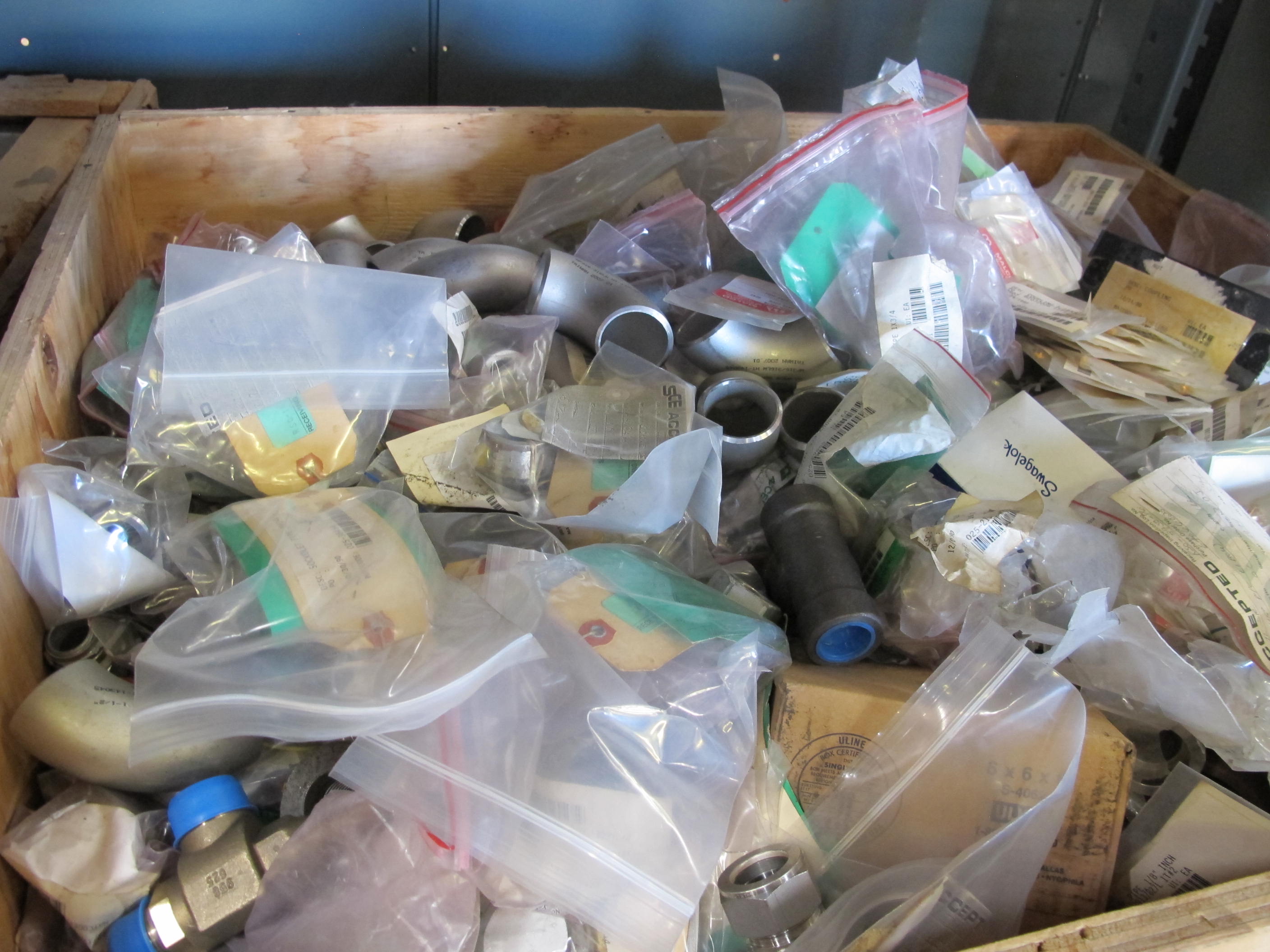 LOT TO INCLUDE: (1 LARGE BOX) MISC. PIPE FITTINGS, COUPLINGS, CAP PIPE. ETC.. LOADING & HANDLING FEE $15-4169